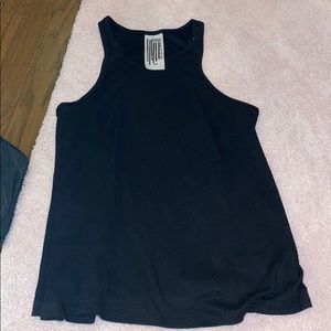 Free people black tank top. Never worn